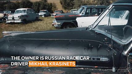 Between two small Russian towns lie hundreds of Soviet cars