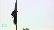 Activist Removes Confederate Flag at South Carolina Capitol