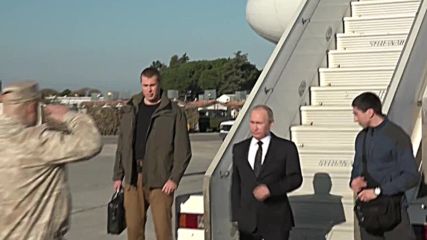 Syria: Putin meets Assad at Russian military base in surprise visit to Syria