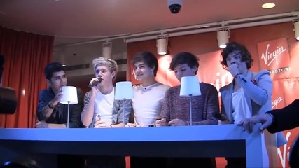 One Direction във Virgin Megastore в Париж, правят разписване на албума си