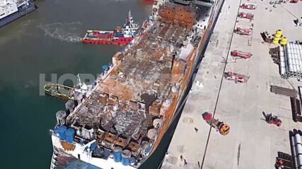 КАДРИ ОТ ДРОН: Какво е останало от ферибота „Юрофери Олимпия" след пожара