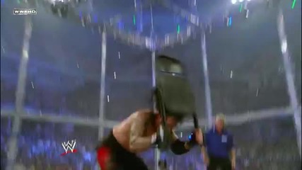 Undertaker hits a Con-chair-to on Edge