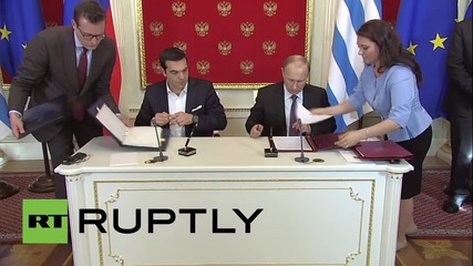 Russia: Putin and Greek PM Tsipras sign cooperation agreement 2015-2016