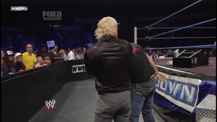 Dolph Ziggler hits a Zig Zag on Edge into the Steel Steps