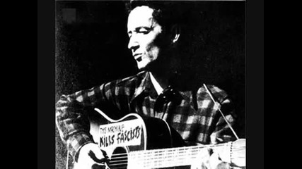 Woody Guthrie - This Land Is Your Land 