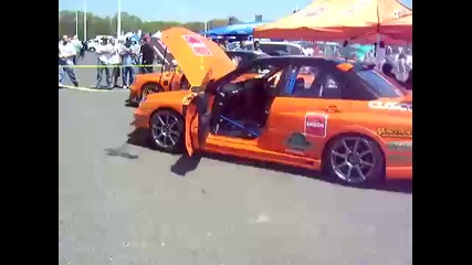 Orange Subaru wrx Sti 