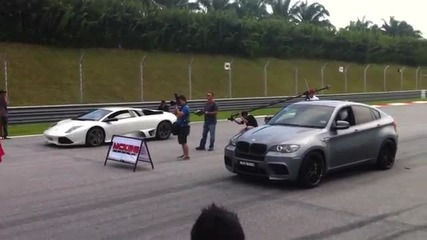 Bmw X6 M vs Lamborghini Murcelago