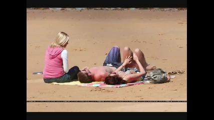 Miley and Liam on the beach 