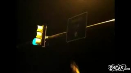 Bottle to Head as Fan Climbs Street Sign 