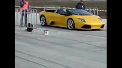 drag race between Porsche 911 turbo s and Lamborghini Murcielago cabrio