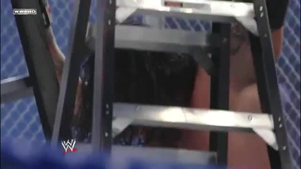 Undertaker Chokeslams Edge through the ring