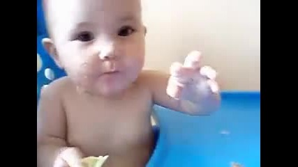 Baby eating Lemon