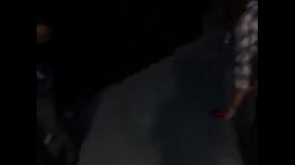 Roger Federer Hitting A Bottle From a Mans Head
