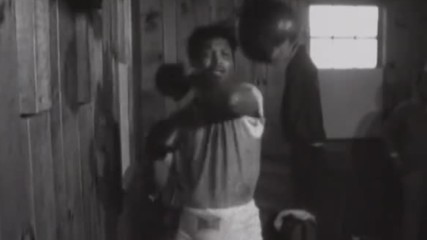 Sugar Ray Robinson boxing a speedball