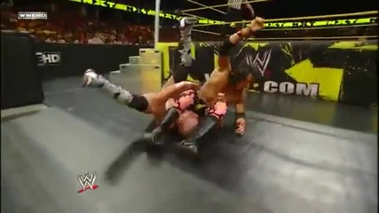 Springboard Corkscrew Senton to the outside - Trent Barreta
