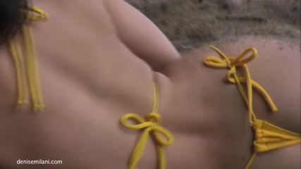Denise Milani -- yellow bikini