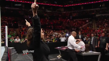 A handcuffed Daniel Bryan is assaulted by Triple H and Stephanie Mcmahon Raw, March 17, 2014