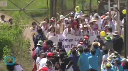 Gloria Steinem and Activists Cross DMZ Between Koreas