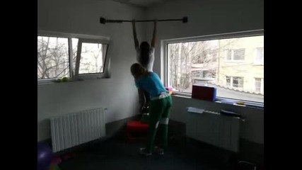 25 kg Weighted Pull - up by Female athlete