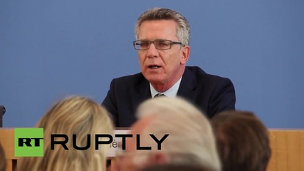 Germany: Pro-refugee activists heckle de Maiziere at government open day