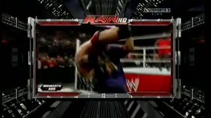 John Cena Attitude Adjustments Heath Slater through the Announcer Table