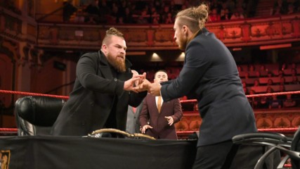 Pete Dunne stands face-to-face with Joe Coffey WWE UK Title Contract Signing: NXT UK, Jan. 2, 2019