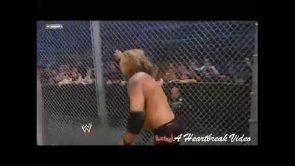 Edge_spears_the_undertaker_throu