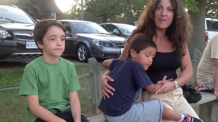 Kid touches mom boobs