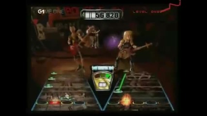 Dave Mustaine playing Guitar Hero Ii on Game One 