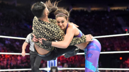 Sunil Singh suffers a Bayley-to-Belly before Finn Bálor takes flight
