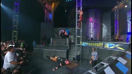 Aj Styles Diving Elbow Drop on Bully Ray