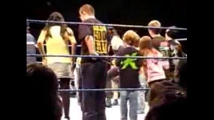 The Undertaker dances with Hornswoggle - Wwe house show