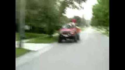 Idiot Driving Outside of His Car