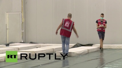 Croatia: First refugees arrive at Zagreb warehouse that will host 1,500 people