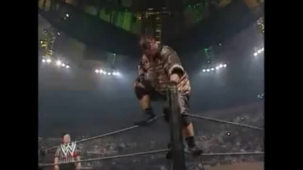 Jamal (umaga) hits a Diving Splash on Jeff Hardy through a Table