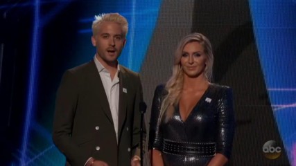 Charlotte Flair presents an award at the 2018 ESPYS on ABC
