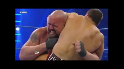 Daniel Bryan - Guillotine choke into Lebell Lock on Big Show