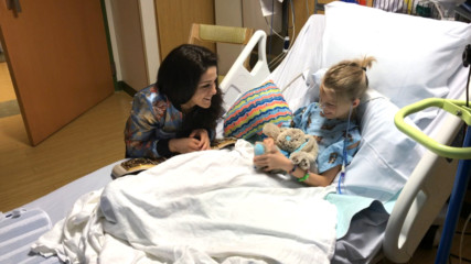 Bayley meets an adorable fan at the Florida Hospital for Children