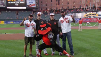 Luke Gallows & Karl Anderson throw out the first pitch for the Baltimore Orioles
