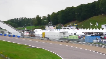 Ferrari Laferrari and Mclaren at a racetrack - Hd