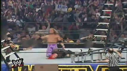 Edge Spears Jeff Hardy off a Ladder
