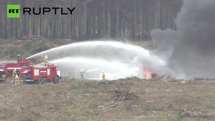 Watch pilot miraculously escape burning helicopter wreckage in Russia!