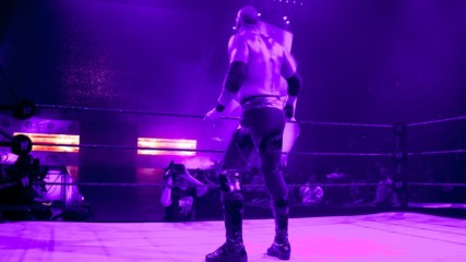Kane is tormented by The Undertaker during his match against Goldberg: Raw, Feb. 2, 2004