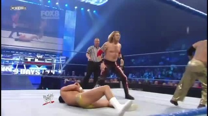 Edge & Rey Mysterio - Wheelbarrow Hold into Body Splash