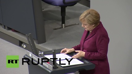 Germany: Merkel talks refugee controls as MPs back tougher legislation
