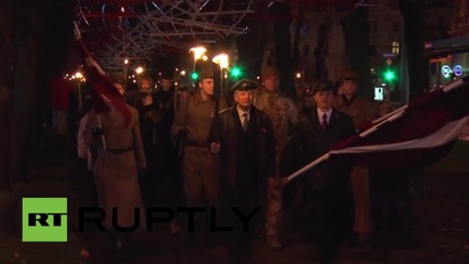 Latvia: Thousands march in torch-lit vigil for War Heroes Remembrance Day