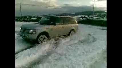 range rover playing in snow 