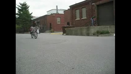 Biker At Purdue Jumps Concrete Ledge