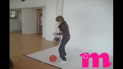 Justin Bieber playing with a basketball at Photoshoot 