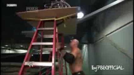 Kane pushes Paul Bearer off a ladder